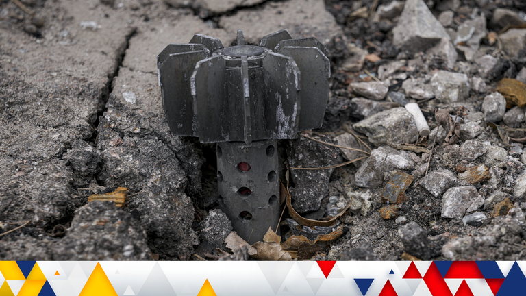Part of a mortar shell in rubble in Stoyanka, west of Kyiv